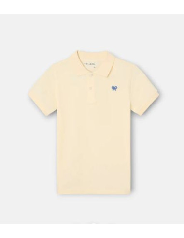 Polo kids liso logo rizo amarillo